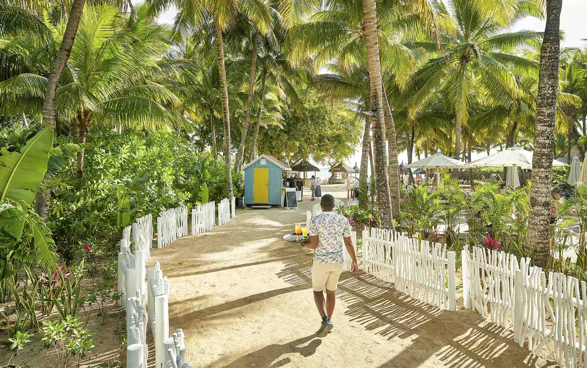 Rejser til Mauritius, The Ravenala Attitude, Et 'Family Member', som Ravenala Attitude selv ben&aelig;vner sine ansatte