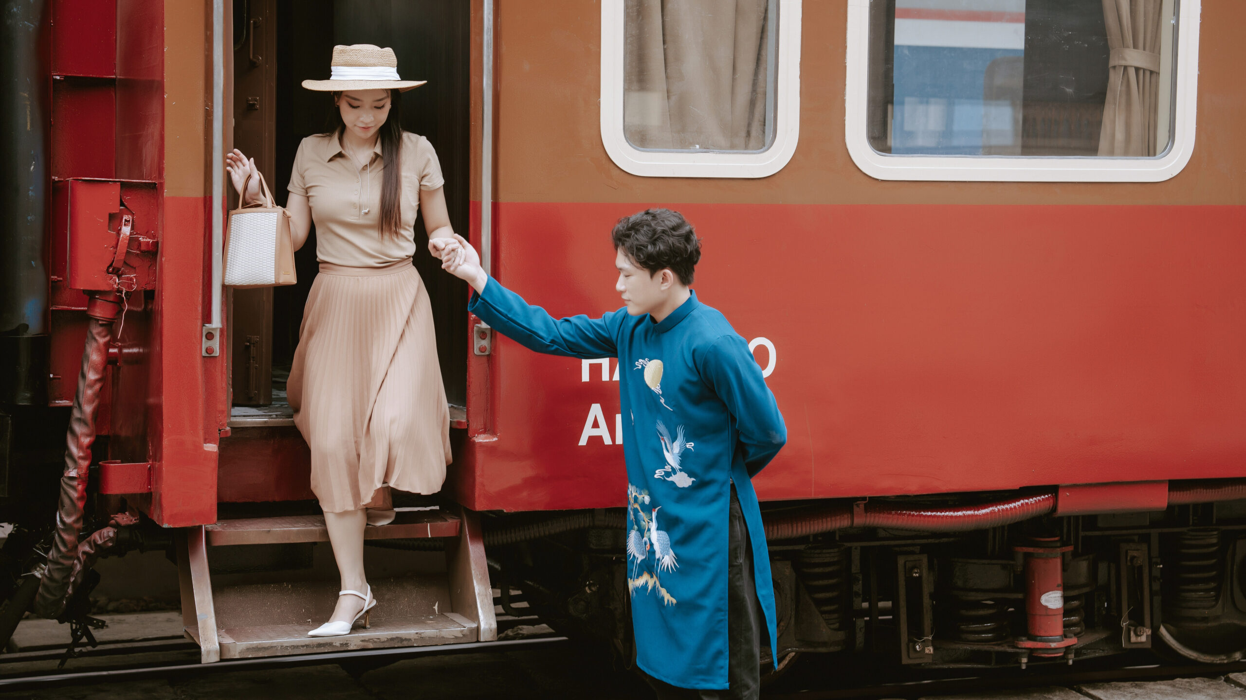 Vietnam sjourney luxury train station lady scaled